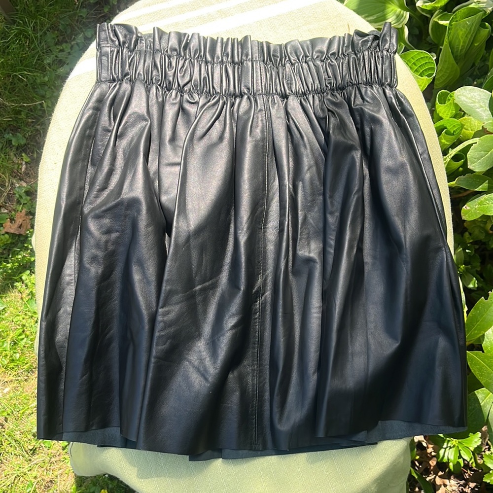 NWT DEA the label size 6 black leather miniskirt.